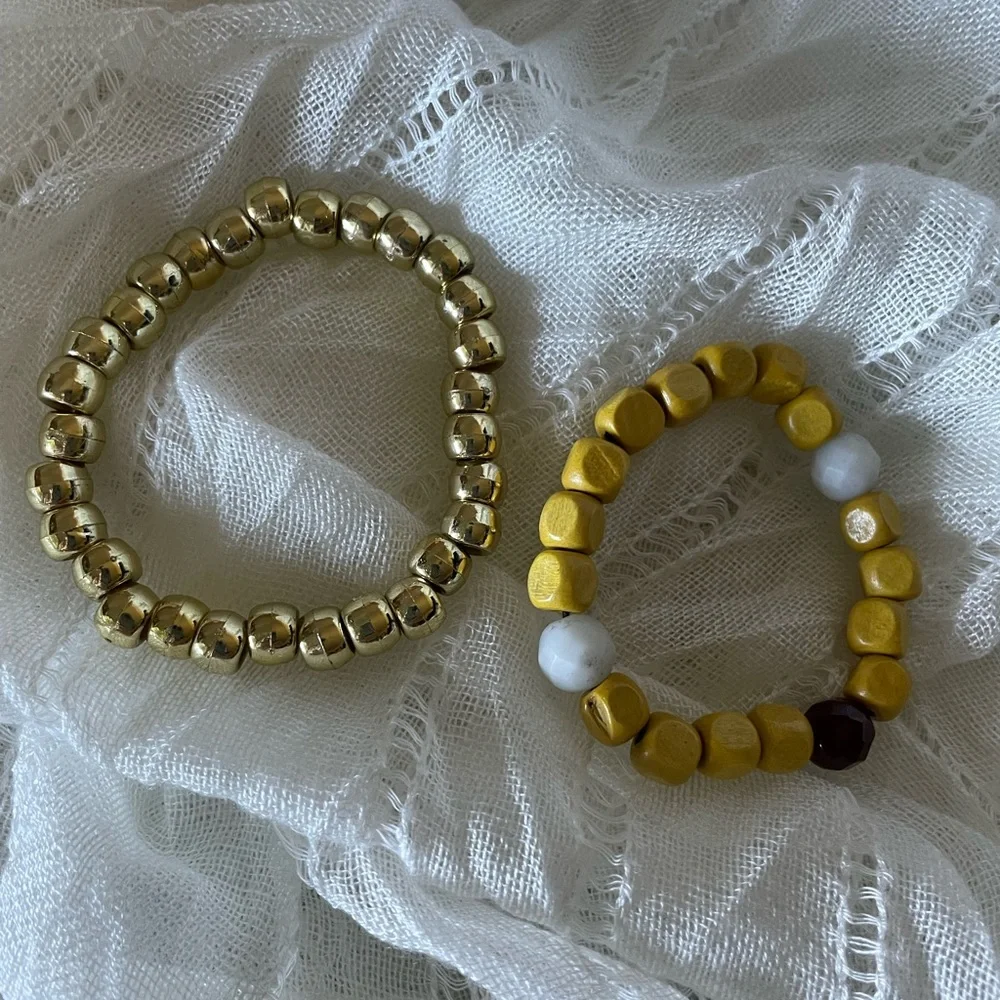 Acrylic gold tone, yellow wood bead stretchy bracelet - 2 strands